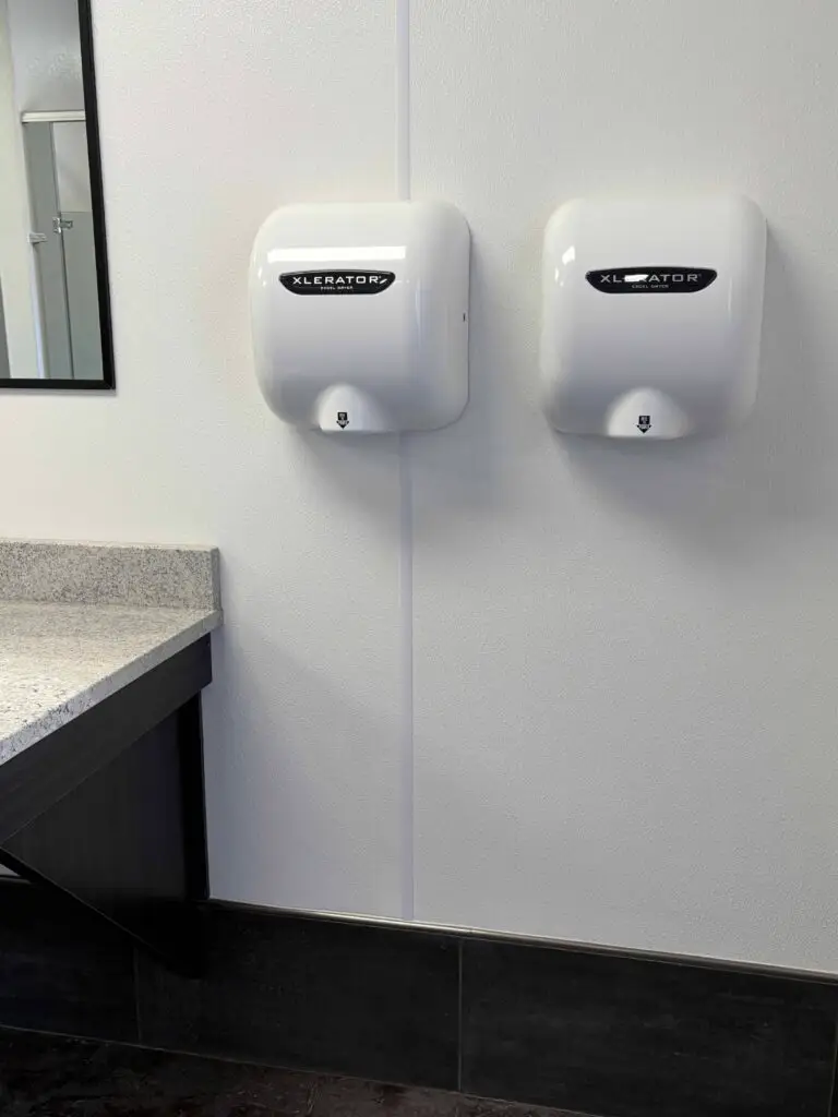 hand dryers installed in a bathroom