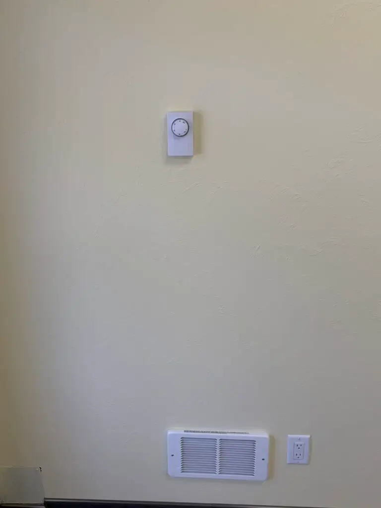 interior thermostat controls on a wall